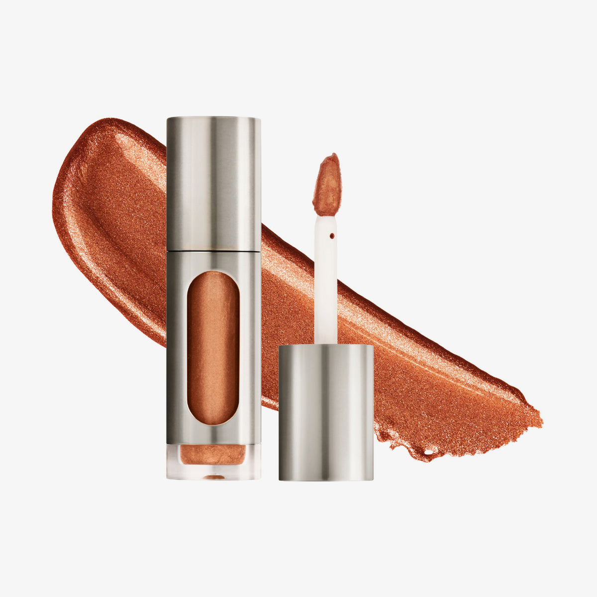 Eine teils silberne und teils transparente Tube Vision Flush Glow Crave mit bronze schimmerndem Inhalt vor weißem Hintergrund.