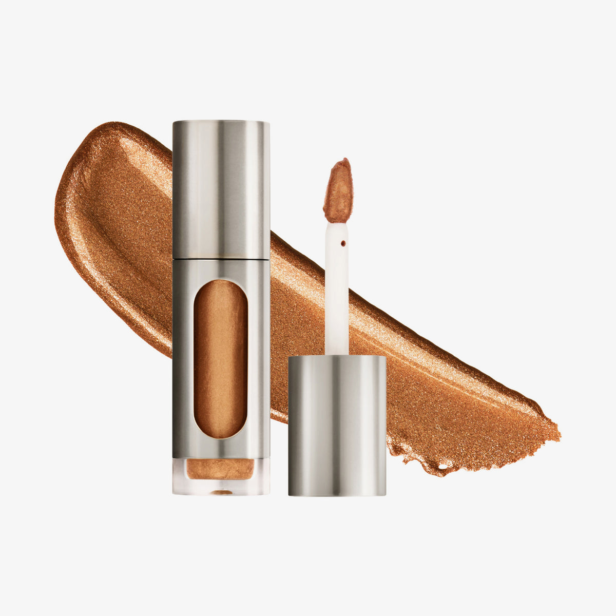 Eine teils silberne und teils transparente Tube Vision Flush Glow Majesty mit gold-bronze schimmerndem Inhalt vor weißem Hintergrund.