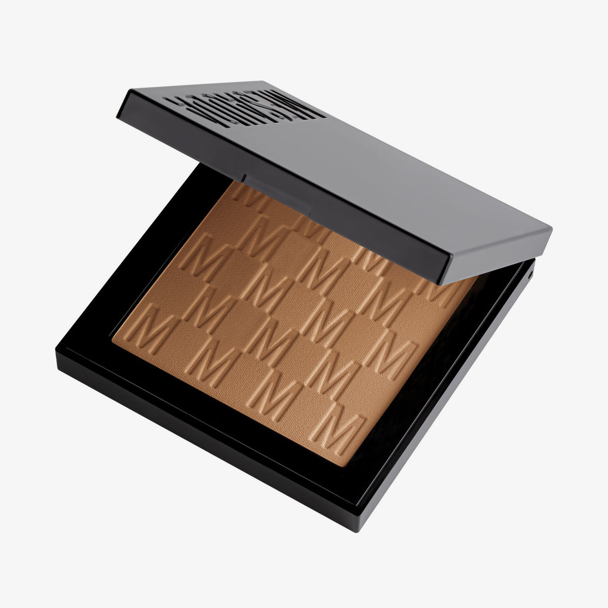 Der halb-geöffnete Bronzer Bronze Venus von Mesauda Beauty in einer quadratischen Produktschale und eingeprägtem M-Muster.
