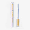 Das Bild zeigt das NABLA Lift & Fix Brow Gel – eine geöffnete, holografisch schimmernde Tube mit goldenem Aufdruck und herausgezogenem Applikator vor weißem Hintergrund.