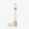 Eine weiß-goldene Tube Re-Generation Concealer in der Farbe Medium Peach mit einer Schwammspitze und der daneben platzierten Kappe.