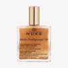 Eine Flasche NUXE Huile Prodigieuse® OR, in 100ml mit goldenem Schimmer für Gesicht, Körper und Haar im Inneren.