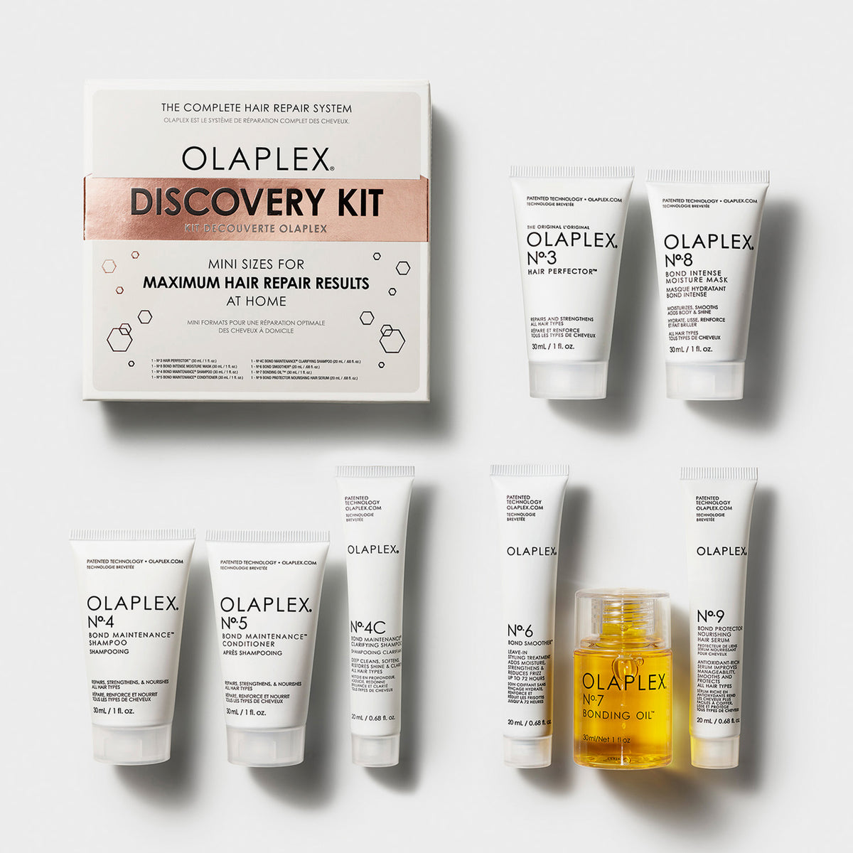 Olaplex Discovery Kit mit acht Mini-Haarpflegeprodukten, liegend präsentiert auf hellem Hintergrund.