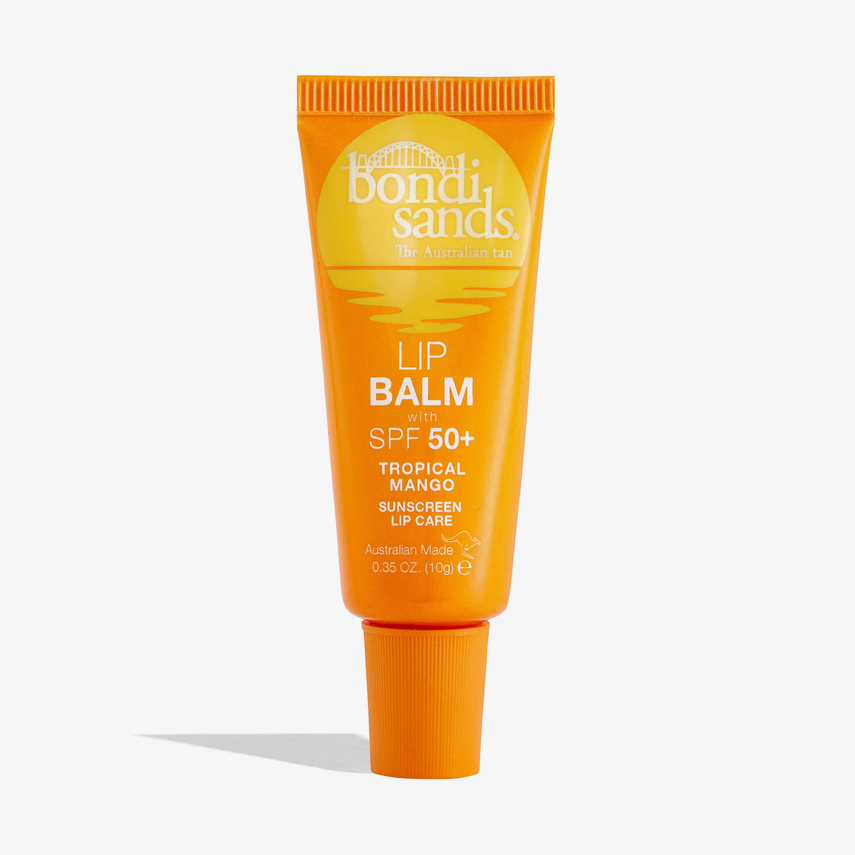 Eine orangefarbene Tube Bondi Sands Lip Balm SPF 50+ Tropical Mango vor weißem Hintergrund