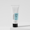 Eine Tube Ultimate Nourishing Rice Overnight Spa Mask auf einer weißen Oberfläche.