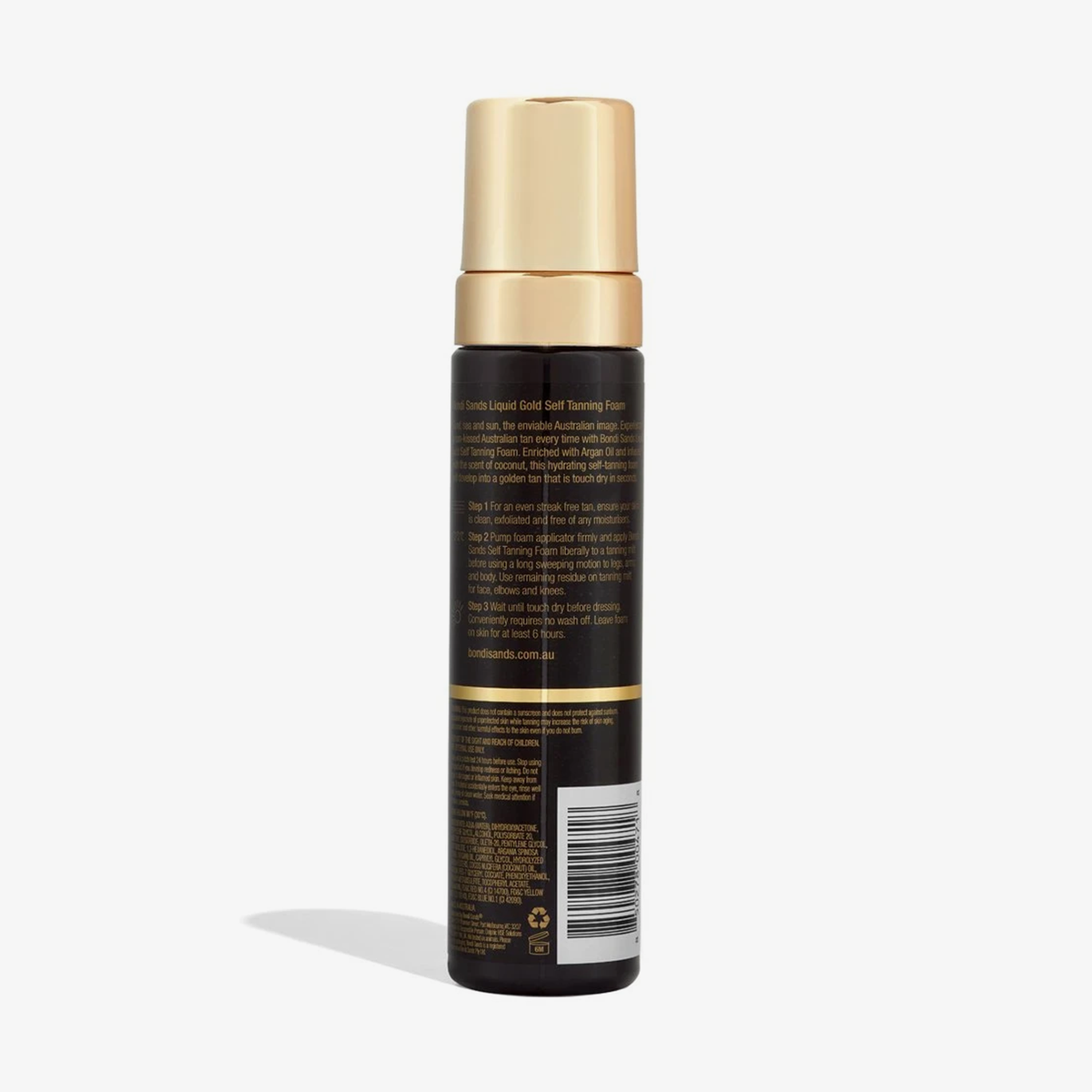 Eine Flasche Self Tanning Foam Liquid Gold mit goldenem Deckel und Text vor weißem Hintergrund