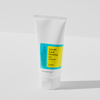 Eine weiße Tube Low-pH Good Morning Gel Cleanser steht auf einer weißen Oberfläche und wirft einen Schatten.