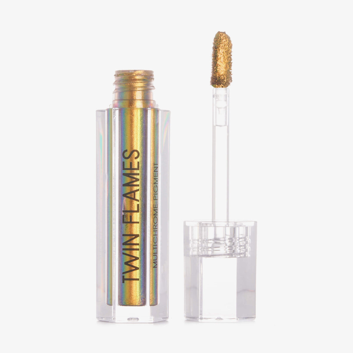 Eine offene durchsichtige Tube Twin Flames Obsession mit gold-grün-blau schimmerndem Inhalt vor weißem Hintergrund.