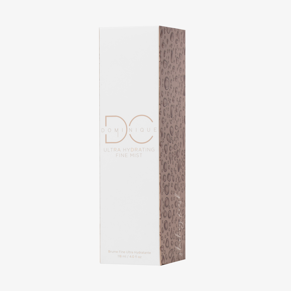 Eine große weiß-goldene Box mit der Aufschrift „Ultra Hydrating Fine Mist“ und einem gemusterten Seitenteil.