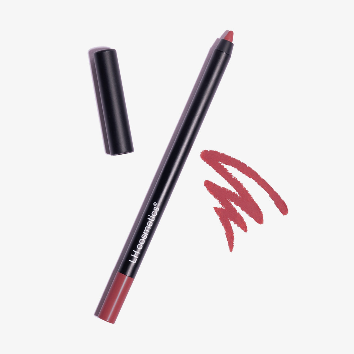 Offener Crayon Lipliner und Make-up-Stift in der Farbe Dusty Pink von LH Cosmetic neben einer Mauve Kritzelei auf weißem Hintergrund.
