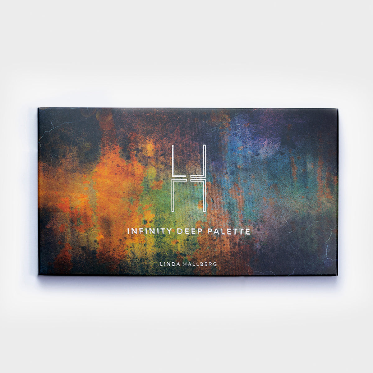 Rechteckige Box der Infinity Deep Palette von LH Cosmetics mit einem farbenfrohen, abstrakten Design.
