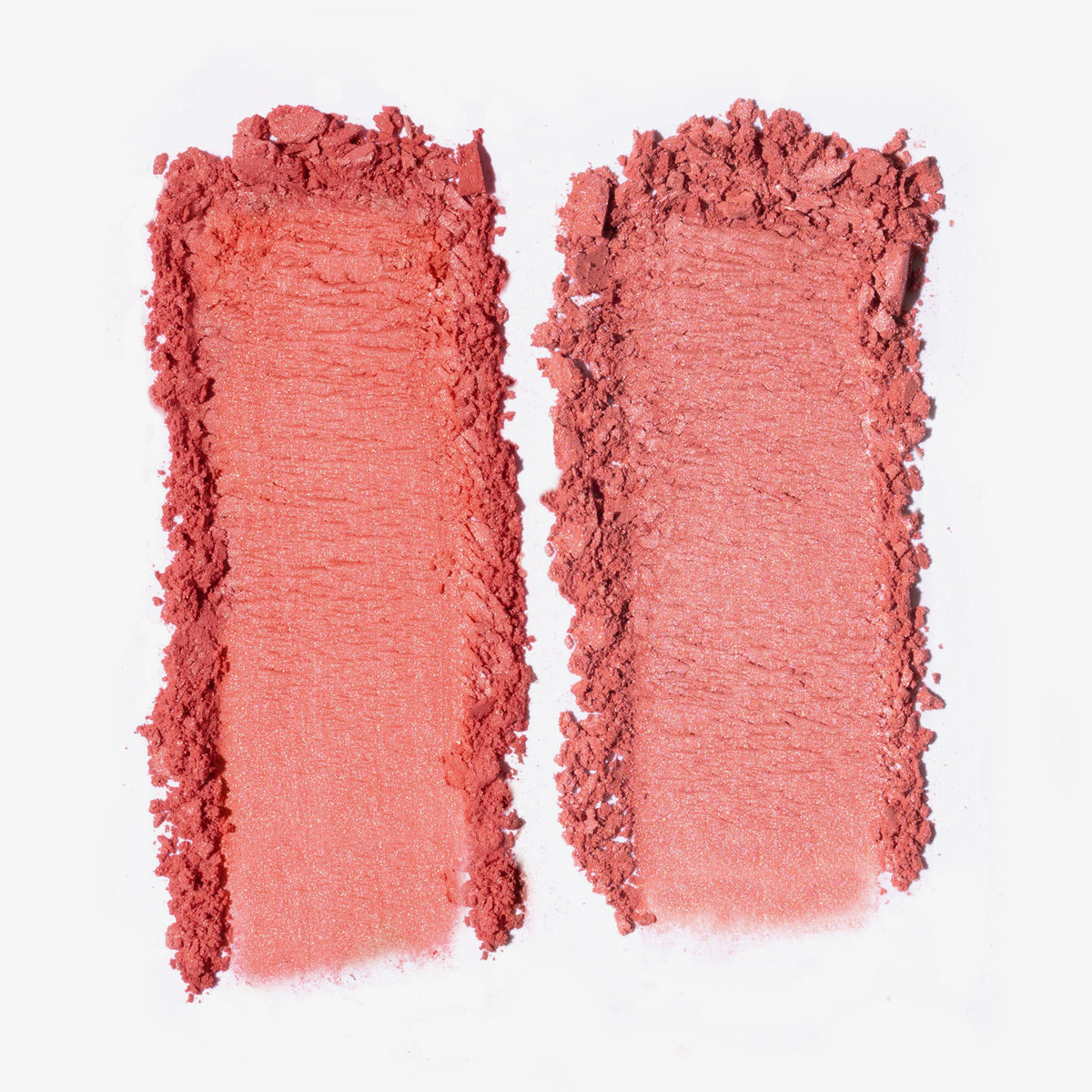 Zwei pudrige Farbmuster der Duo Dimension Zone von LH Cosmetics, nebeneinander auf weißem Hintergrund.