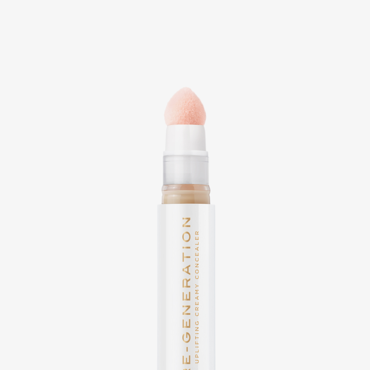 Nahaufnahme der weiß-goldenen Tube Re-Generation Concealer in der Farbe Ivory mit rosafarbener Schwammspitze – für helle Haut mit goldenem Unterton.