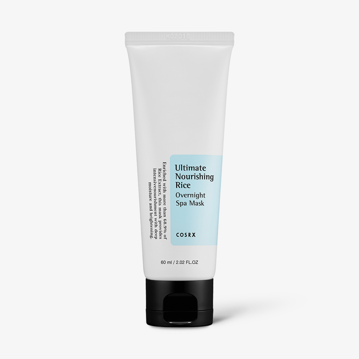 Weiße Tube Ultimate Nourishing Rice Overnight Spa Mask von COSRX mit schwarzem Deckel vor weißem Hintergrund.