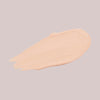 Ein Klecks Wide Awake Full Coverage Concealer Cream Brulee in Beige auf einem blassen Hintergrund.
