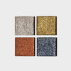 Vier Pfännchen der LH Cosmetics Basic Elements mit Glitzerlidschatten – Silber, Gold, Kupfer und Dunkelblau – auf weißem Hintergrund.