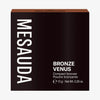 Die schwarze Schachtel des Mesauda Beauty Bronze Venus Bronzers aufrecht vor einem weißen Hintergrund.

