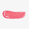Ein Abstrich des Gloss Matrix Lipgloss von Mesauda Beauty auf einem weißen Hintergrund verschmiert.
