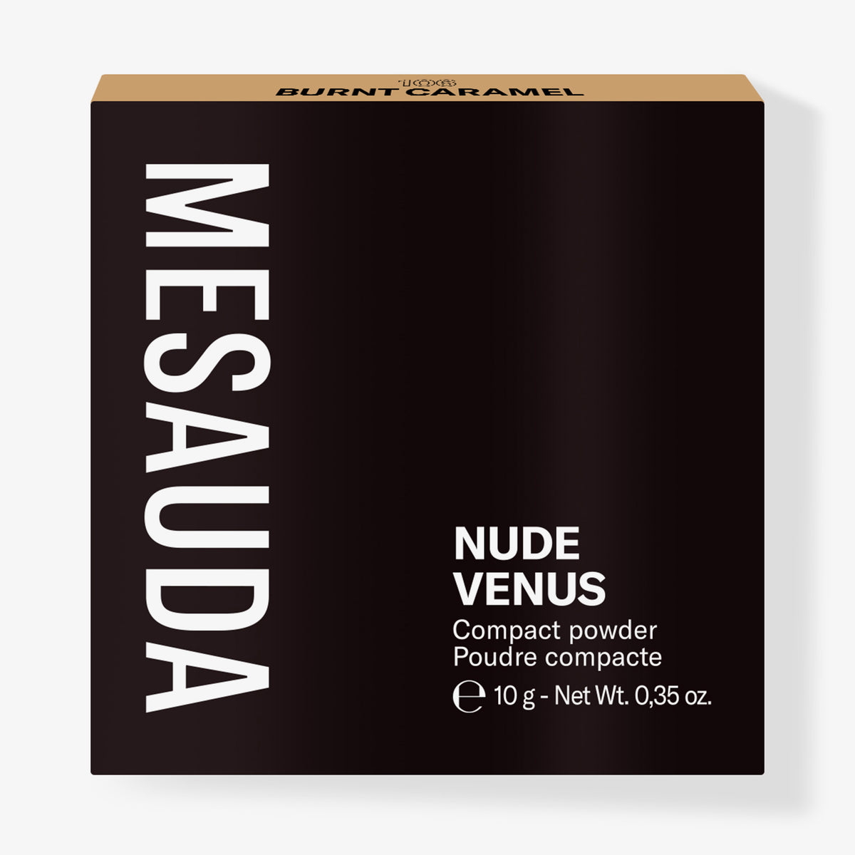 Die schwarze Schachtel des Mesauda Beauty Nude Venus Puders aufrecht vor einem weißen Hintergrund.

