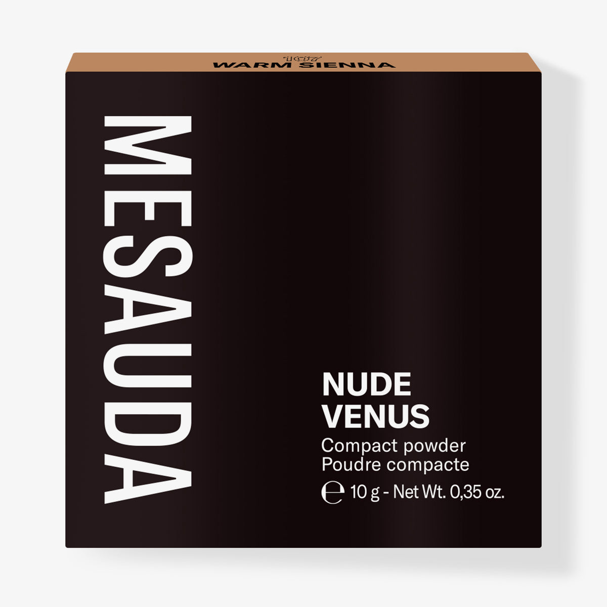 Die schwarze Schachtel des Mesauda Beauty Nude Venus Puders aufrecht vor einem weißen Hintergrund.
