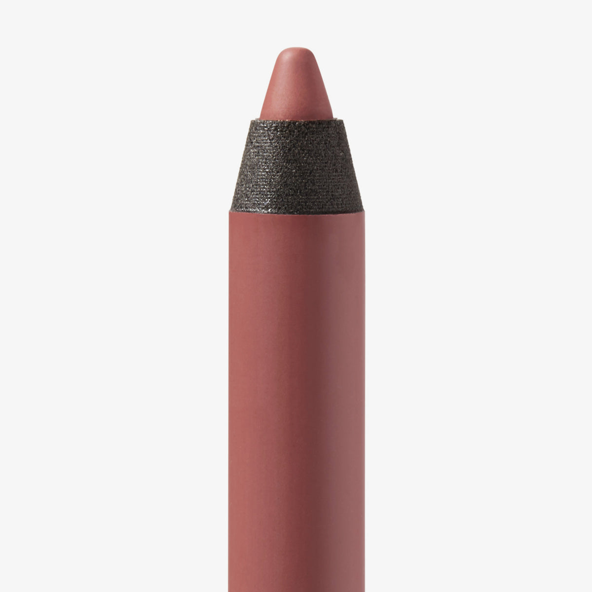 Nahaufnahme der Spitze des Close-Up Lip Shaper Lippenkonturenstifts in der Farbe Nude #3.5, ein gedecktes Rosabraun, vor weißem Hintergrund.