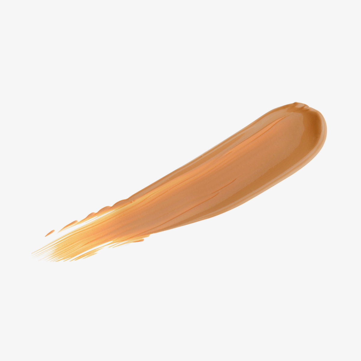 Cremiger Concealer-Swatch in einem satten, goldstichigen Bernsteinton – Nuance „Amber“.