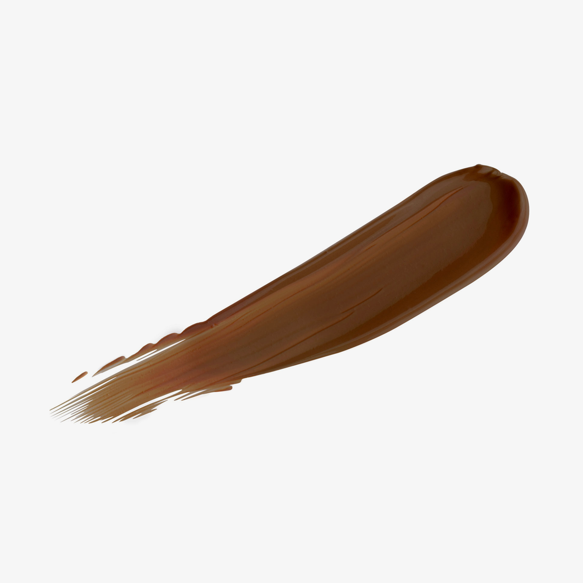 Cremiger Concealer-Swatch in einem tiefen, warmen Braunton – Nuance „Mocha“.