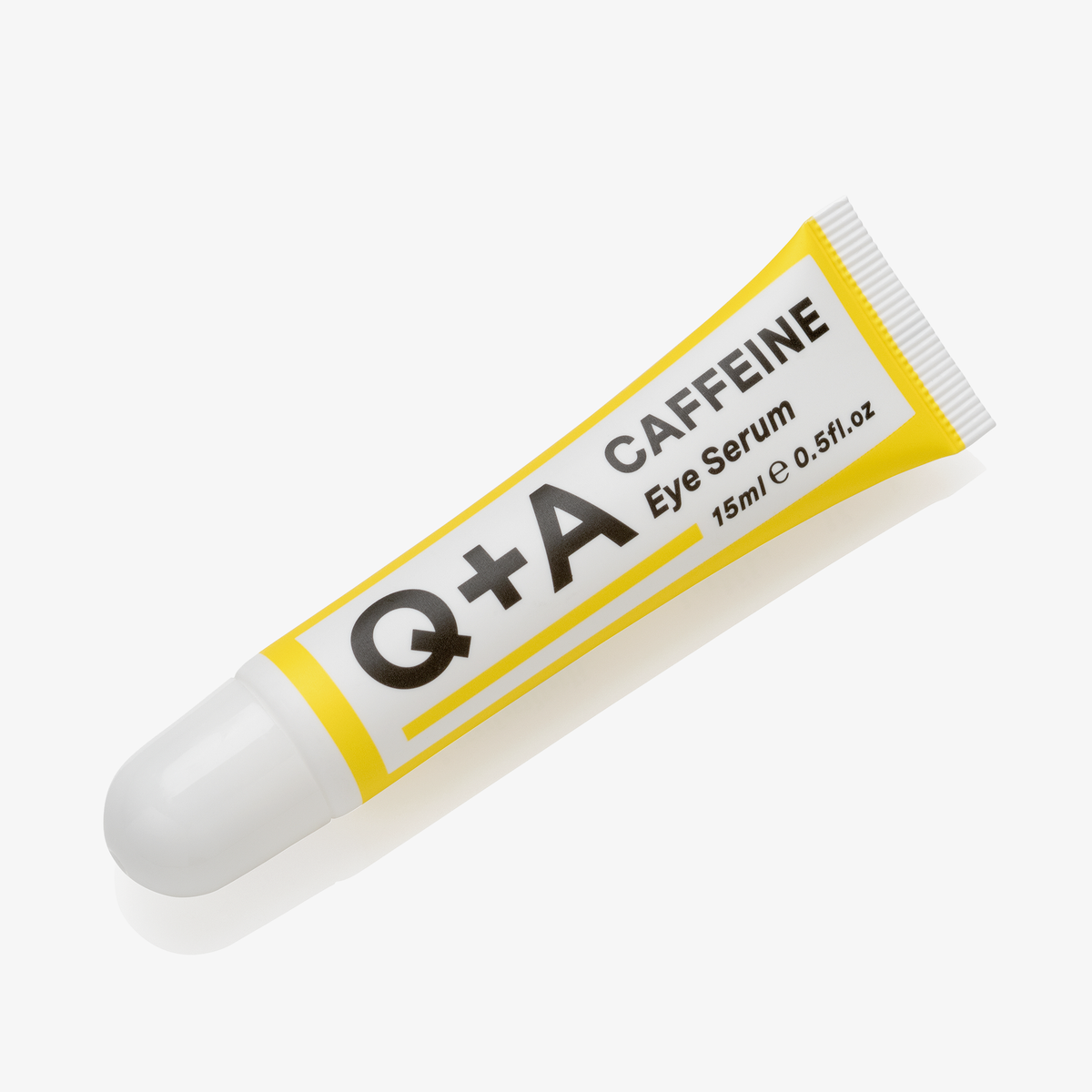 Vor einem weißen Hintergrund ist eine gelbe Tube Koffein-Augenserum 15 ml mit weißem Deckel abgebildet.