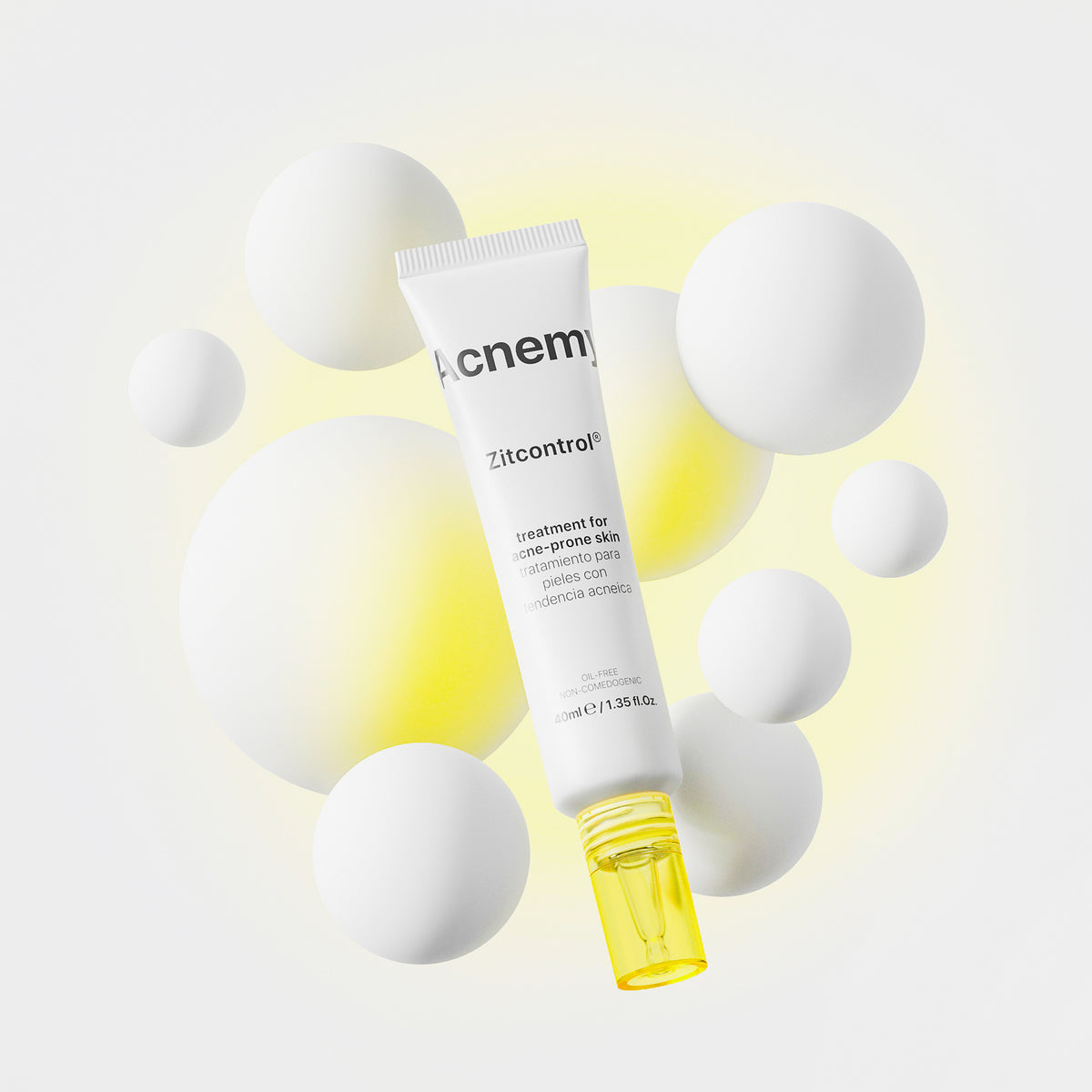 Eine Tube Acnemy Zitcontrol® vor weiß-gelben Blasen