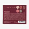 Rückseite der Unconditional-Palette mit Farbnamen, Zutatenliste und Markendetails auf burgunderfarbenem Hintergrund.