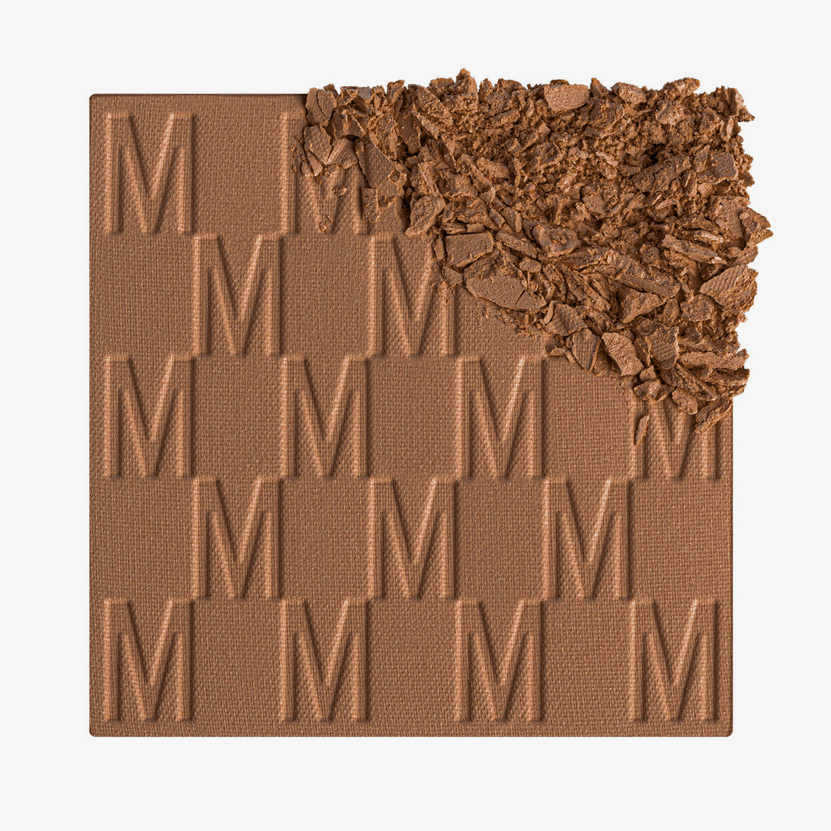 Der Bronzer Bronze Venus von Mesauda Beauty mit eingeprägtem M-Muster, die obere, rechte Ecke ist in losem Puder zerkleinert dargestellt.
