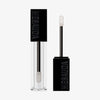 Der Gloss Matrix Lipgloss von Mesauda Beauty in einer rechteckigen Tube mit dem Deckel und Applikator daneben.
