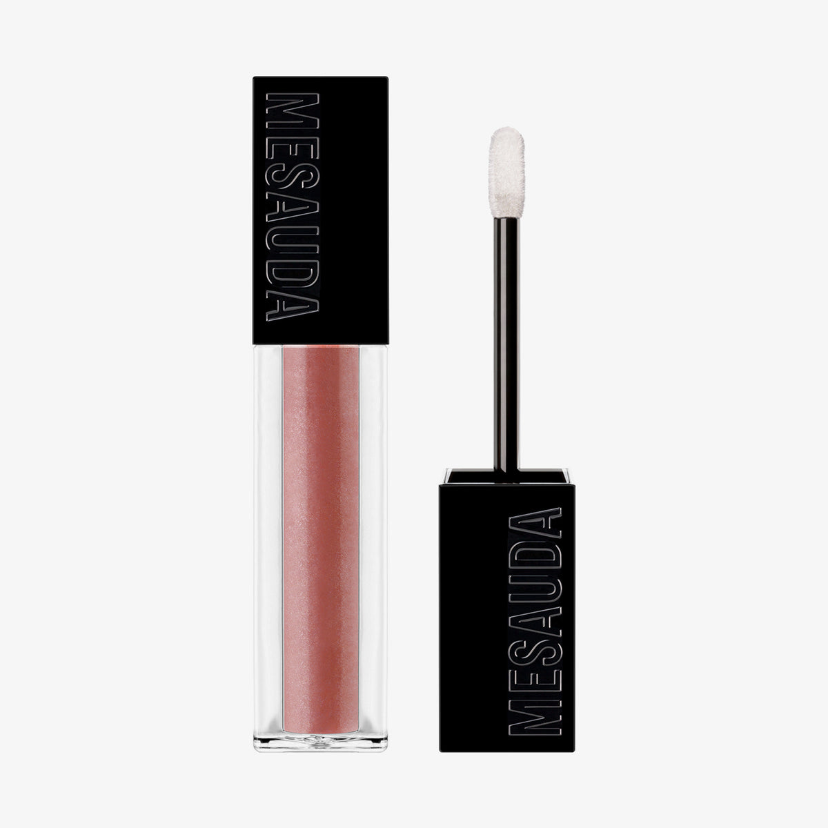 Der Gloss Matrix Lipgloss von Mesauda Beauty in einer rechteckigen Tube mit dem Deckel und Applikator daneben.

