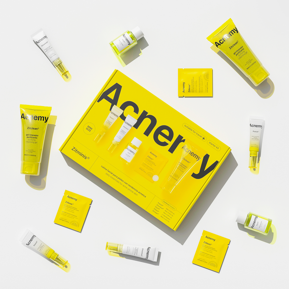Das Acnemy Zitminis® Set liegt auf weißem Grund mit mehreren Minis drumherum