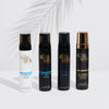 Vier unterschidliche Flaschen Bondi Sands Self Tanning Foam mit Palmblattschatten im Hintergrund