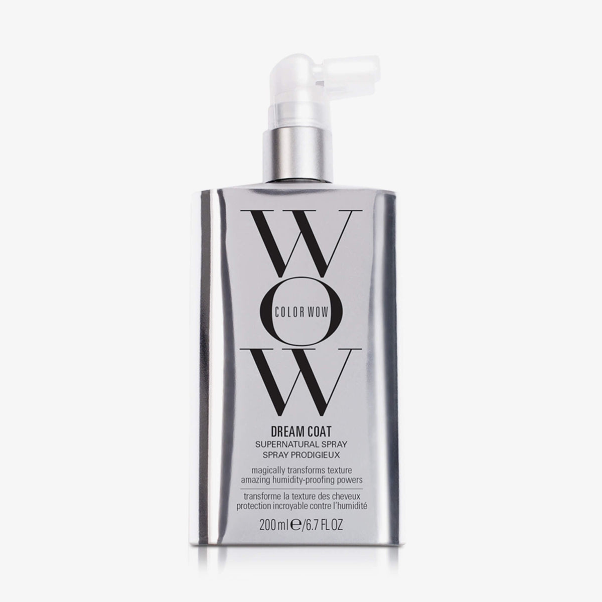 Eine silberne Flasche Dream Coat Supernatural Spray mit weiß-transparentem Sprühspender vor weißem Hintergrund.