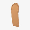 Ein Farbstreifen Chroma Cover Foundation Matte in der Farbe W7 auf weißem Hintergrund.